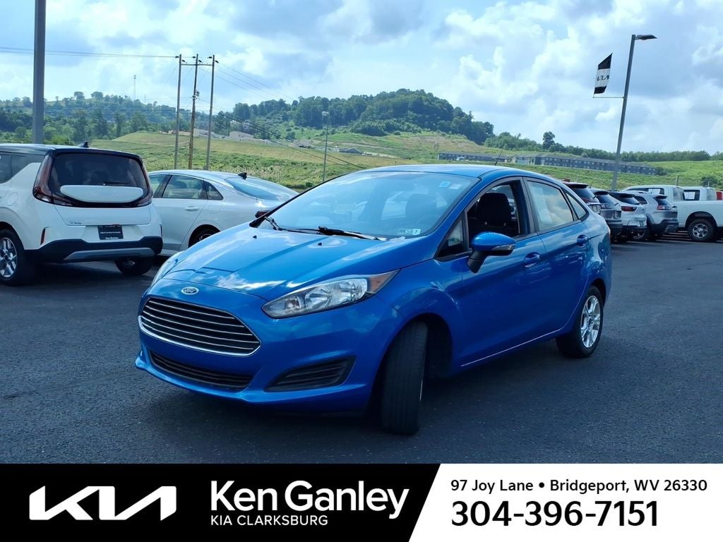 2015 Ford Fiesta — rear three-quarter view