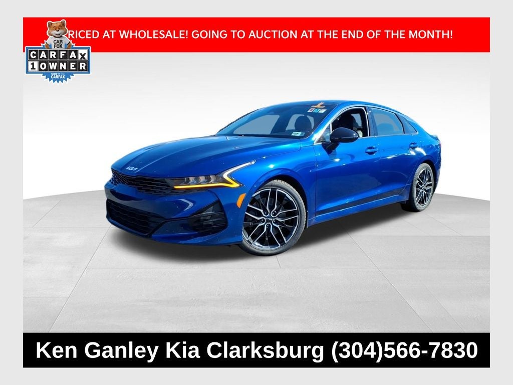 2023 Kia K5 GT in Sapphire Blue — front three-quarter view